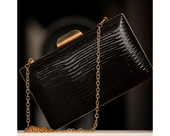 Black metal hardshell clutch